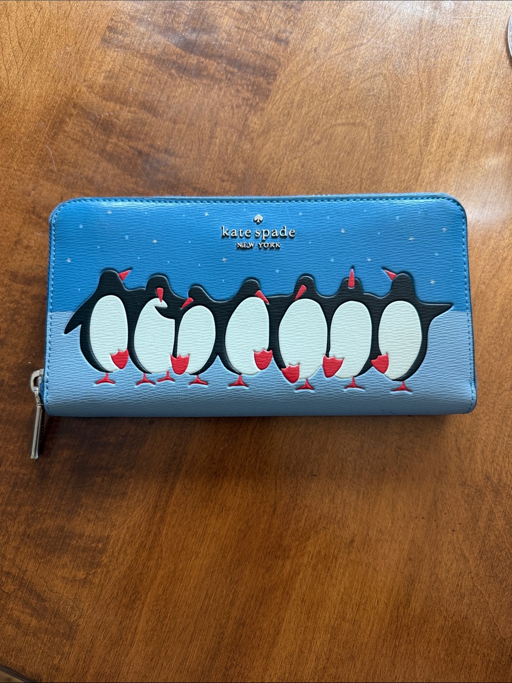 kate spade blue penguin print zip-around wallet